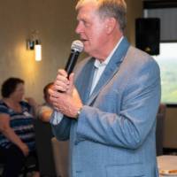 tom continues to address crowd